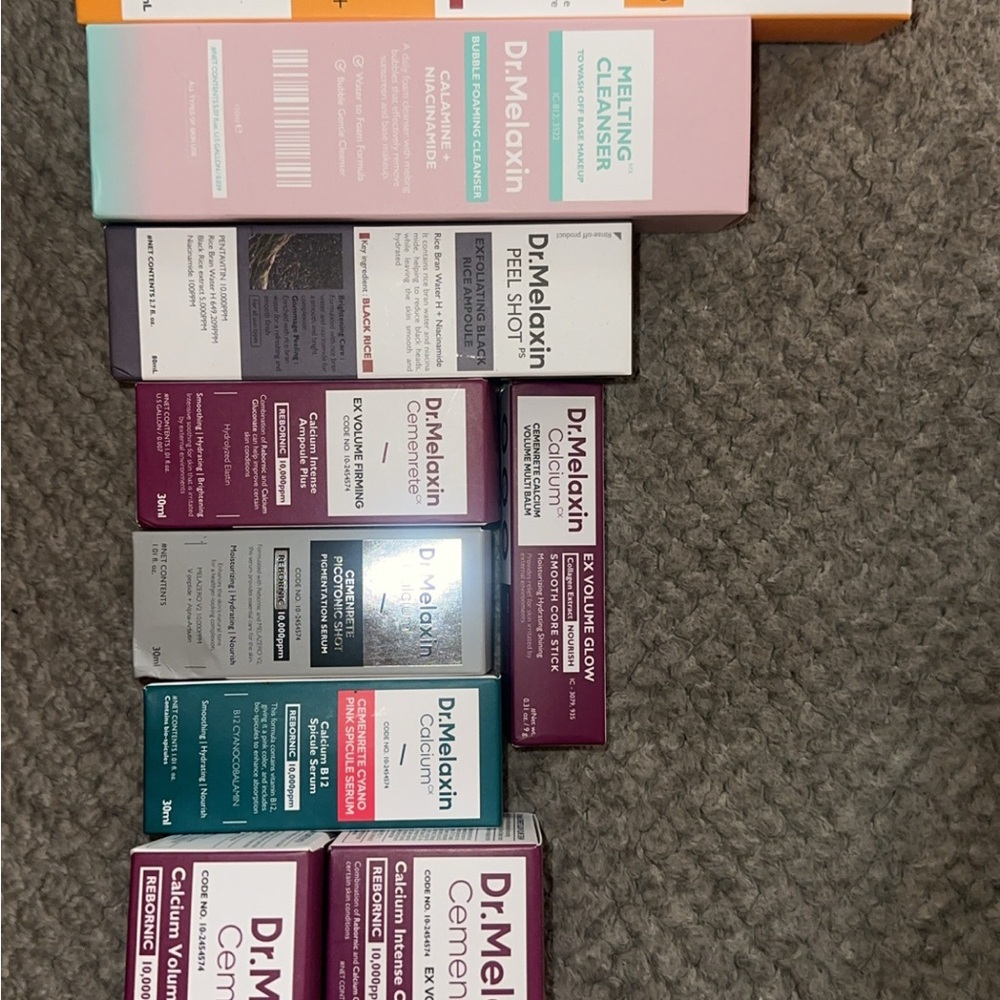 De.Melaxin Skincare Serum & Face Oil Set - Purple and White